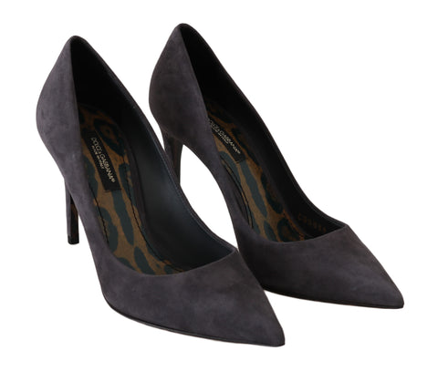 Gray suede leather stiletto heels by Dolce & Gabbana, featuring pointed toes and elegant high-heeled design.