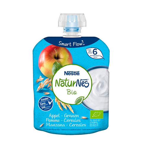 Organic Naturnes Bio Dairy Apple and Cereals baby food jar by Jag Couture London New York, with apple slices and cereal grains visible.