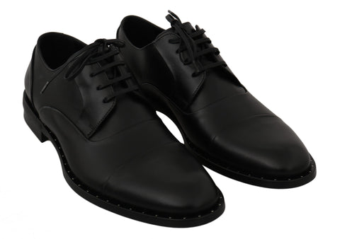 Black leather Derby formal shoes by Dolce & Gabbana, featuring sleek design and polished finish.