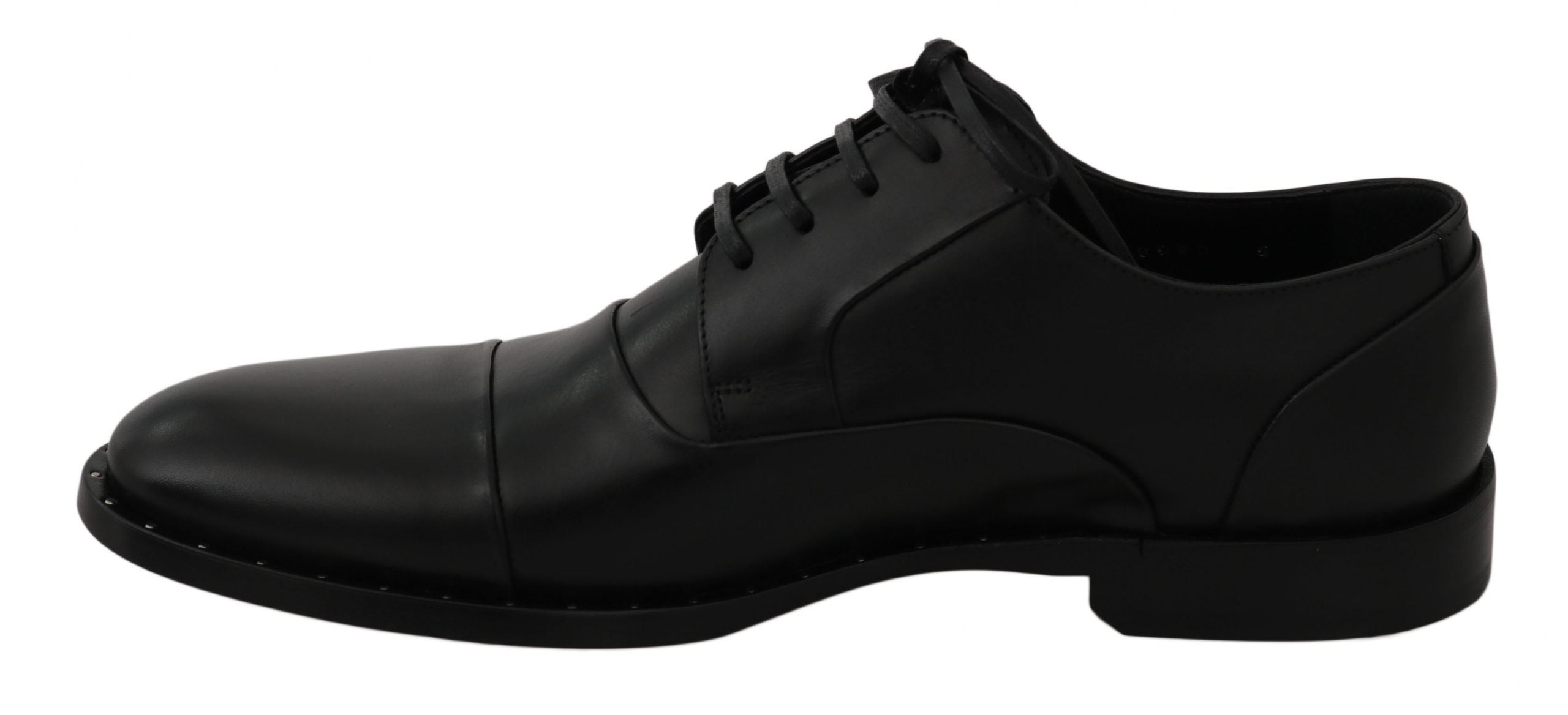 Black leather Derby formal shoes by Dolce & Gabbana, showing sleek design and polished finish on a plain background.