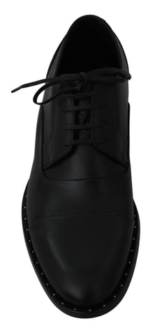 Black leather Derby formal shoes by Dolce & Gabbana, showing classic design with polished finish and lace-up style.