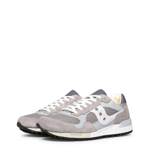 Saucony Shadow-5000 sneakers featuring a stylish design with suede and mesh upper, white midsole, and colorful accents.