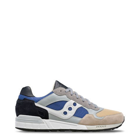 Saucony Shadow-5000 sneakers in black and white with tan accents, showcasing classic running shoe design from Jag Couture London-New York.