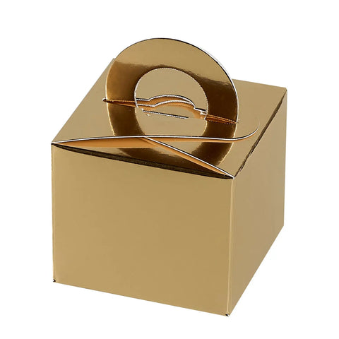 Eight shiny gold chocolate carry boxes by Jag Couture London New York, perfect for gift packaging or special occasions.