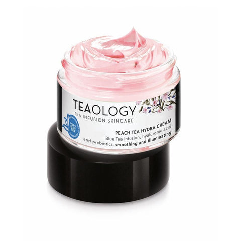 Peach Tea Moisturising Cream by Teaology in a 50ml jar, featuring a smooth, peach-colored cream with fresh peach and tea leaf accents.