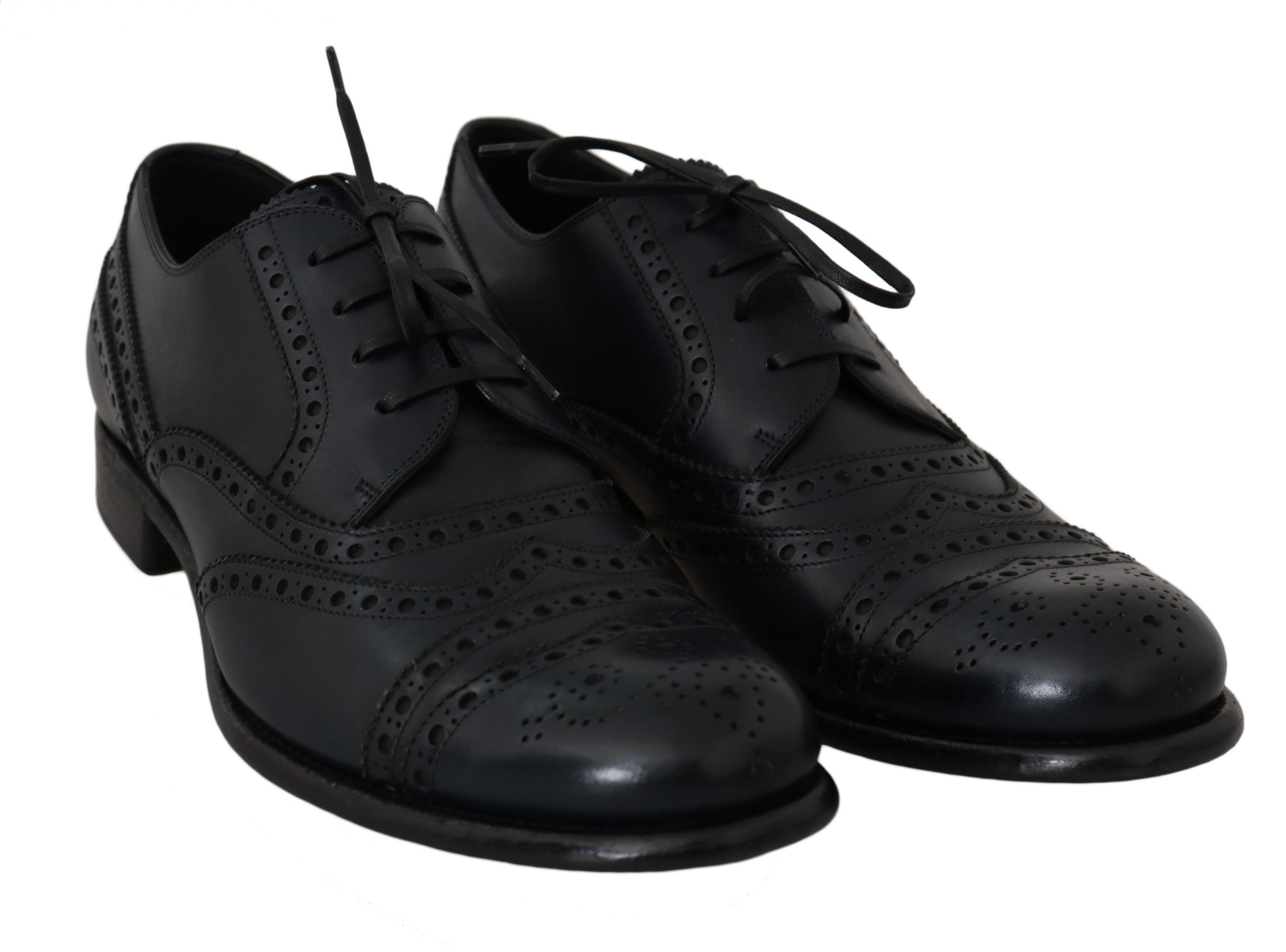Dark blue leather wingtip Oxford dress shoes by Dolce & Gabbana, showing polished leather with brogue detailing and classic lace-up design.