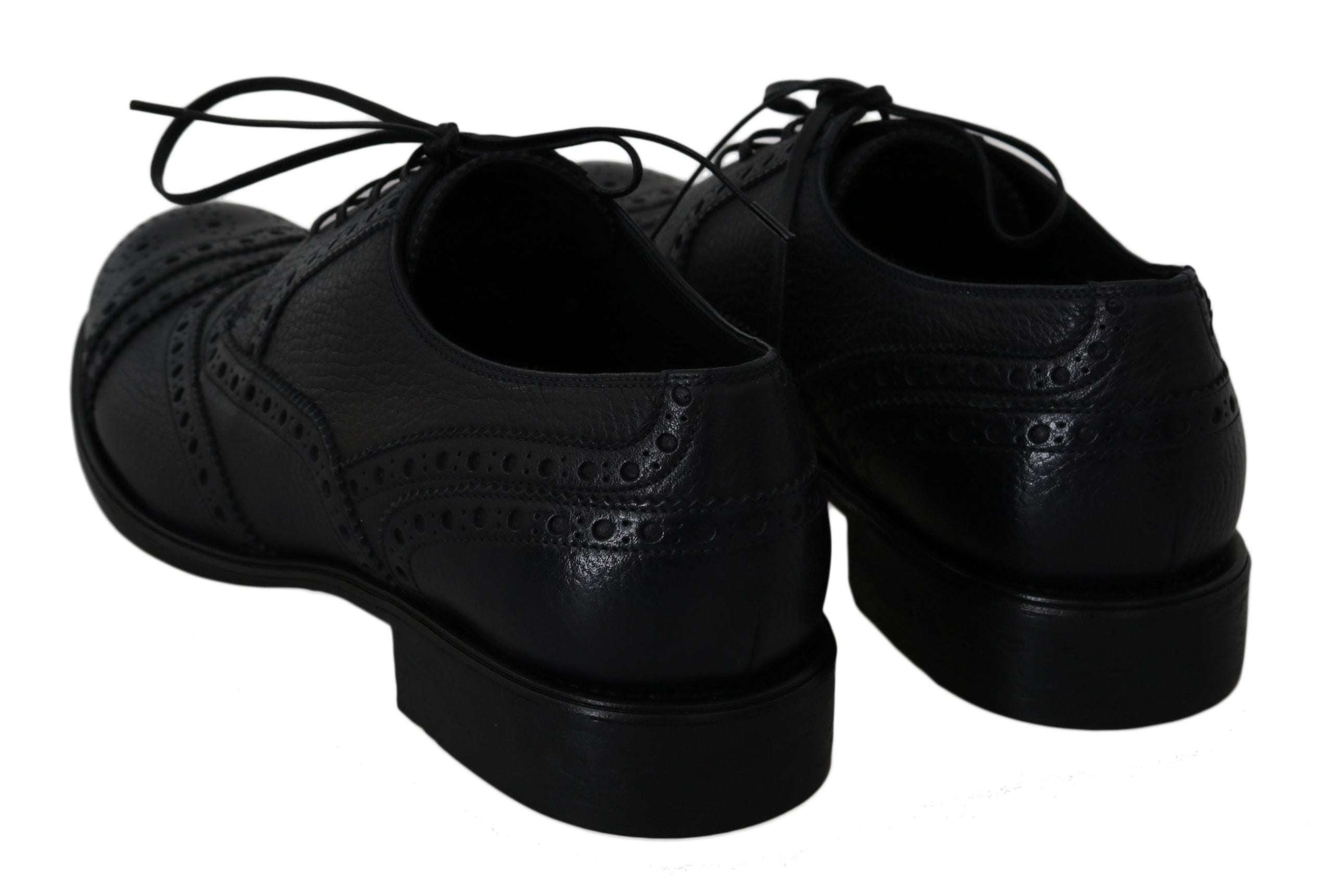 Blue leather wingtip Oxford dress shoes by Dolce & Gabbana, featuring classic brogue detailing and sleek, polished finish.