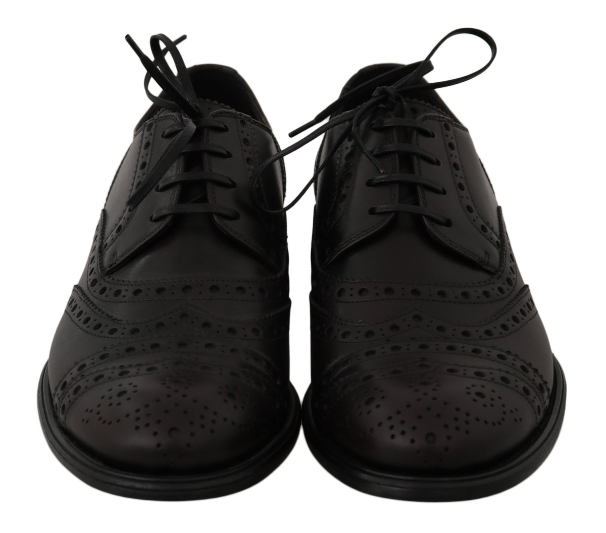 Black leather wingtip Oxford dress shoes by Dolce & Gabbana, featuring classic brogue detailing and sleek, polished finish.