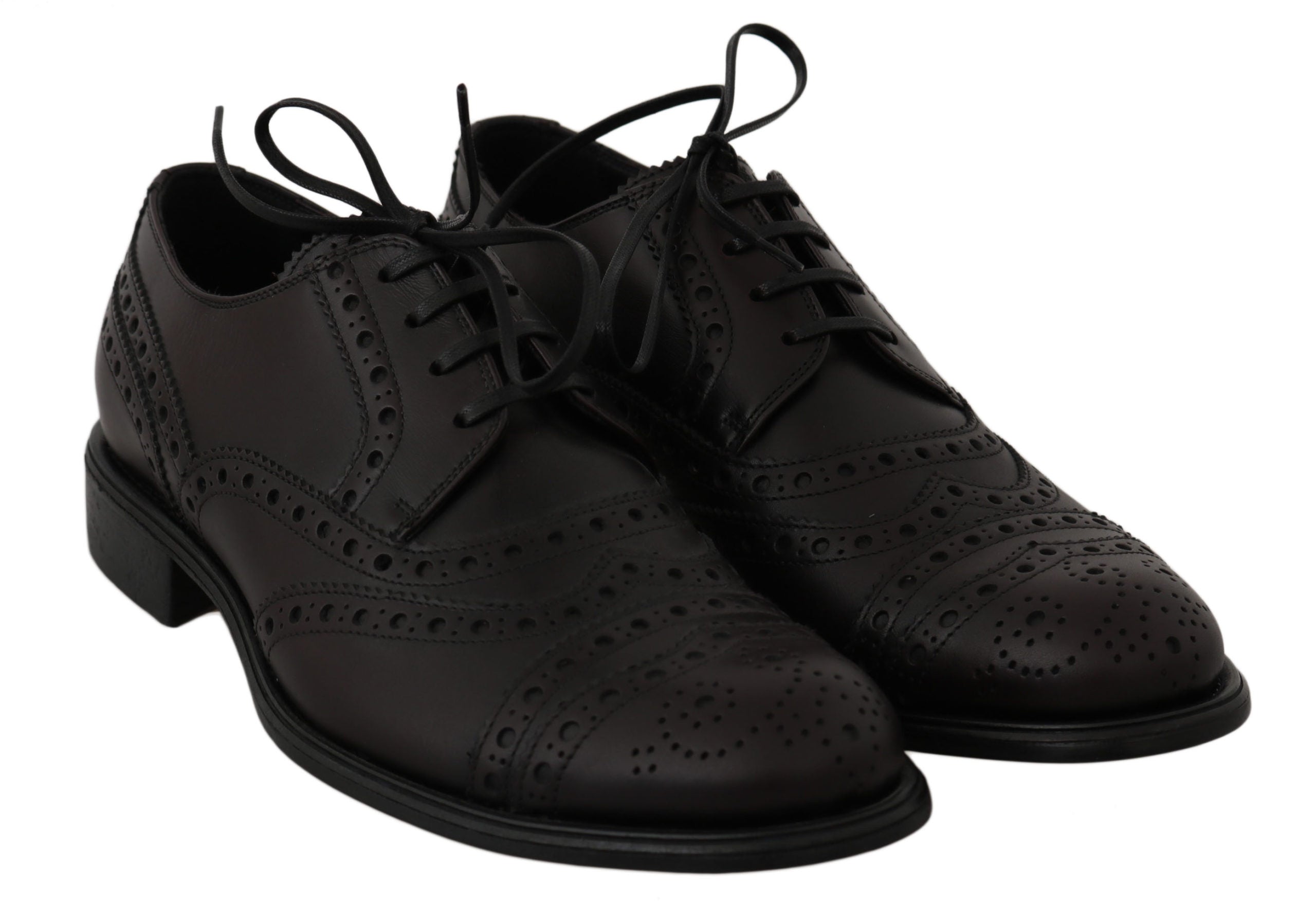 Black leather wingtip Oxford dress shoes by Dolce & Gabbana, featuring classic brogue detailing and polished finish.