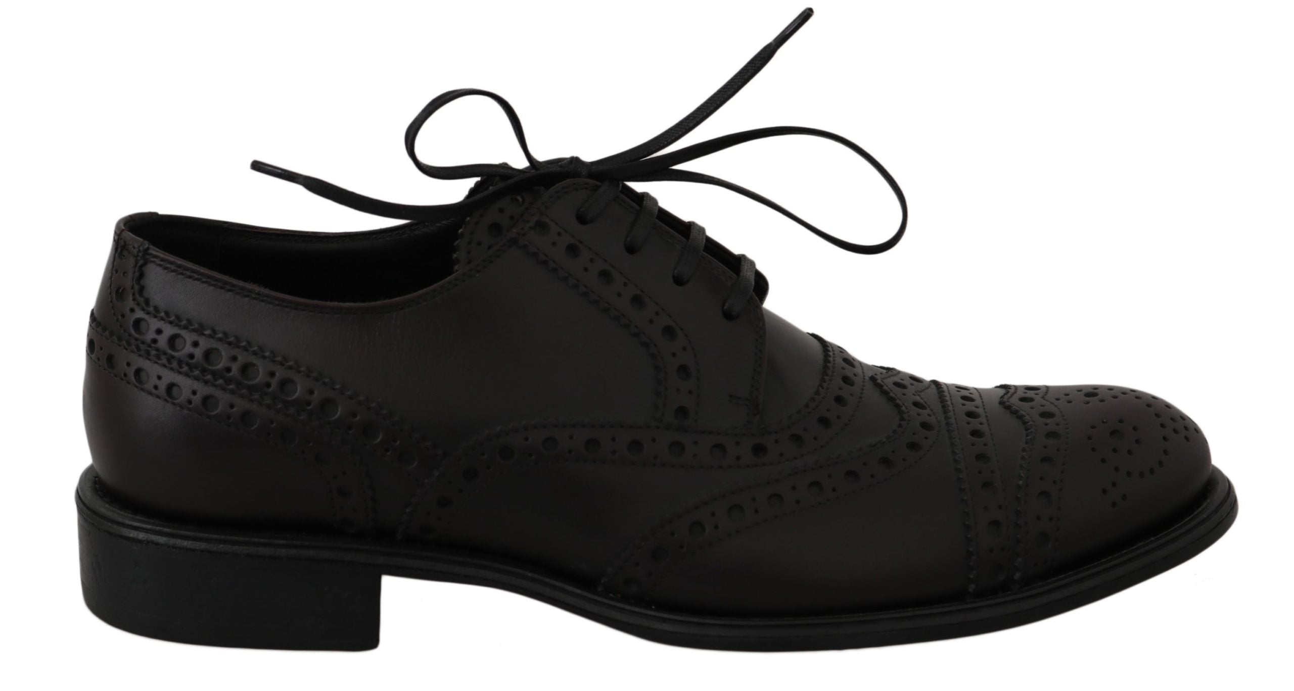 Black leather wingtip Oxford dress shoes by Dolce & Gabbana, featuring classic brogue detailing and polished finish.