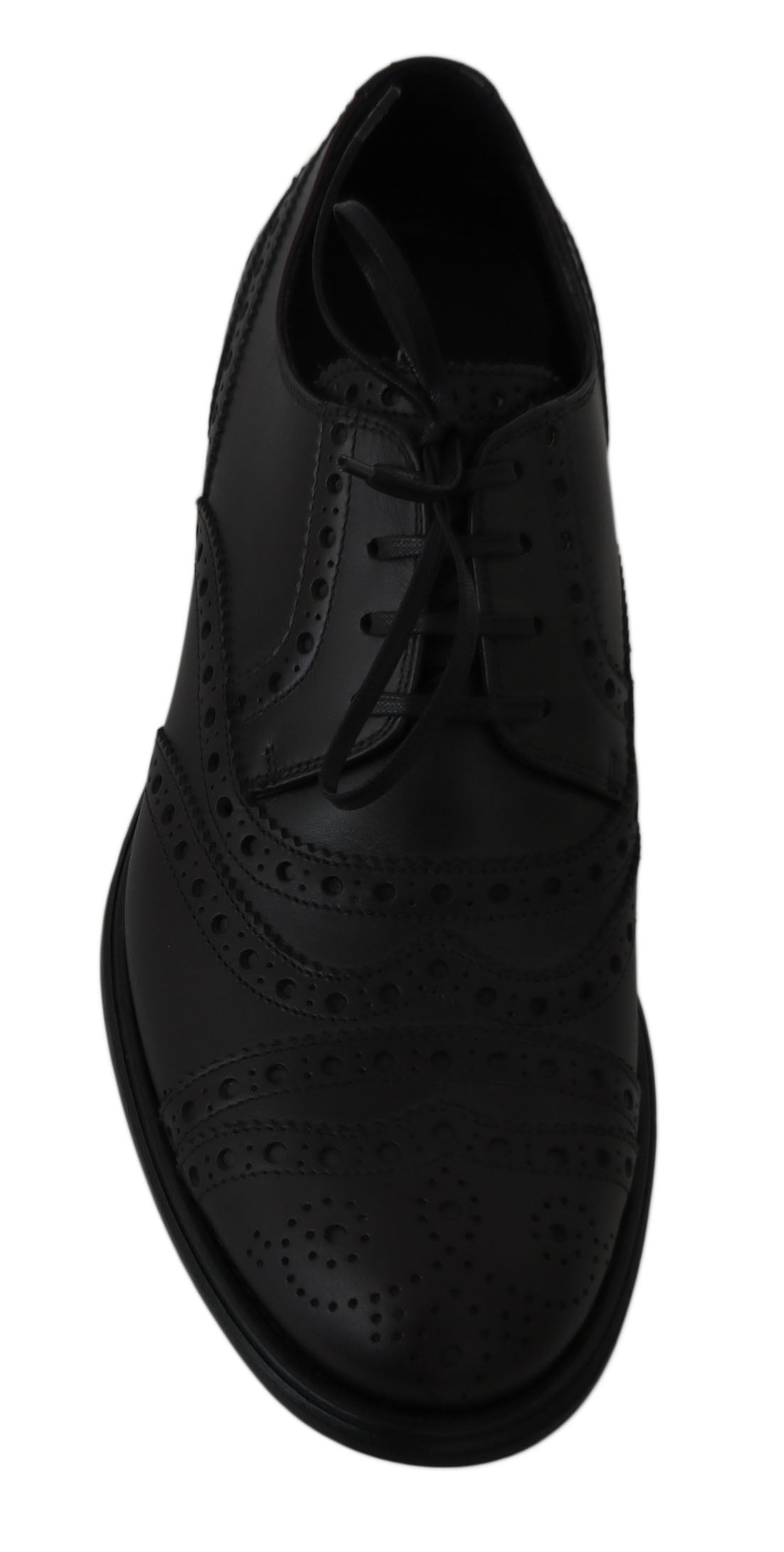 Black leather wingtip Oxford dress shoes by Dolce & Gabbana with detailed brogue accents and classic lace-up design.