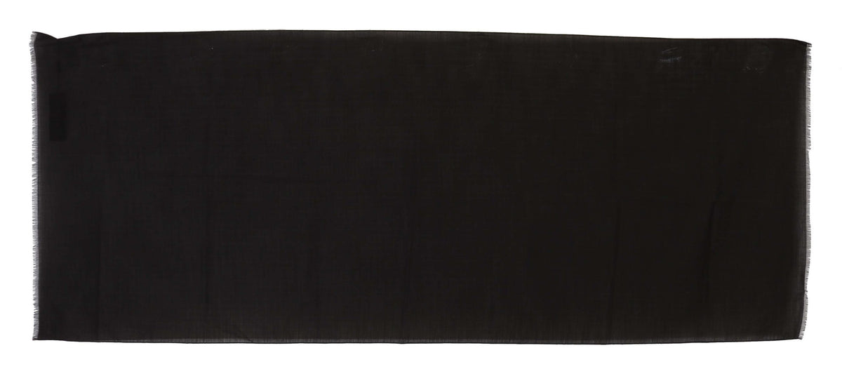 Dark gray virgin wool wrap scarf with black and gray striped pattern from Dolce & Gabbana, soft and stylish for cold weather.