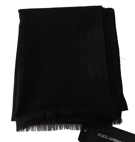 Dark gray virgin wool wrap scarf with striped pattern from Dolce & Gabbana, shown draped on a neutral background.