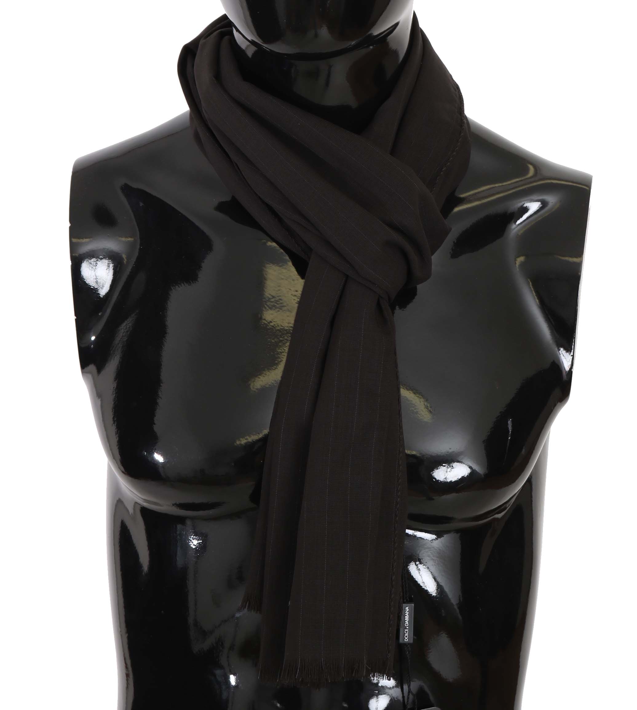 Dark gray Virgin Wool striped wrap scarf by Dolce & Gabbana, shown draped with a stylish pattern and soft texture.