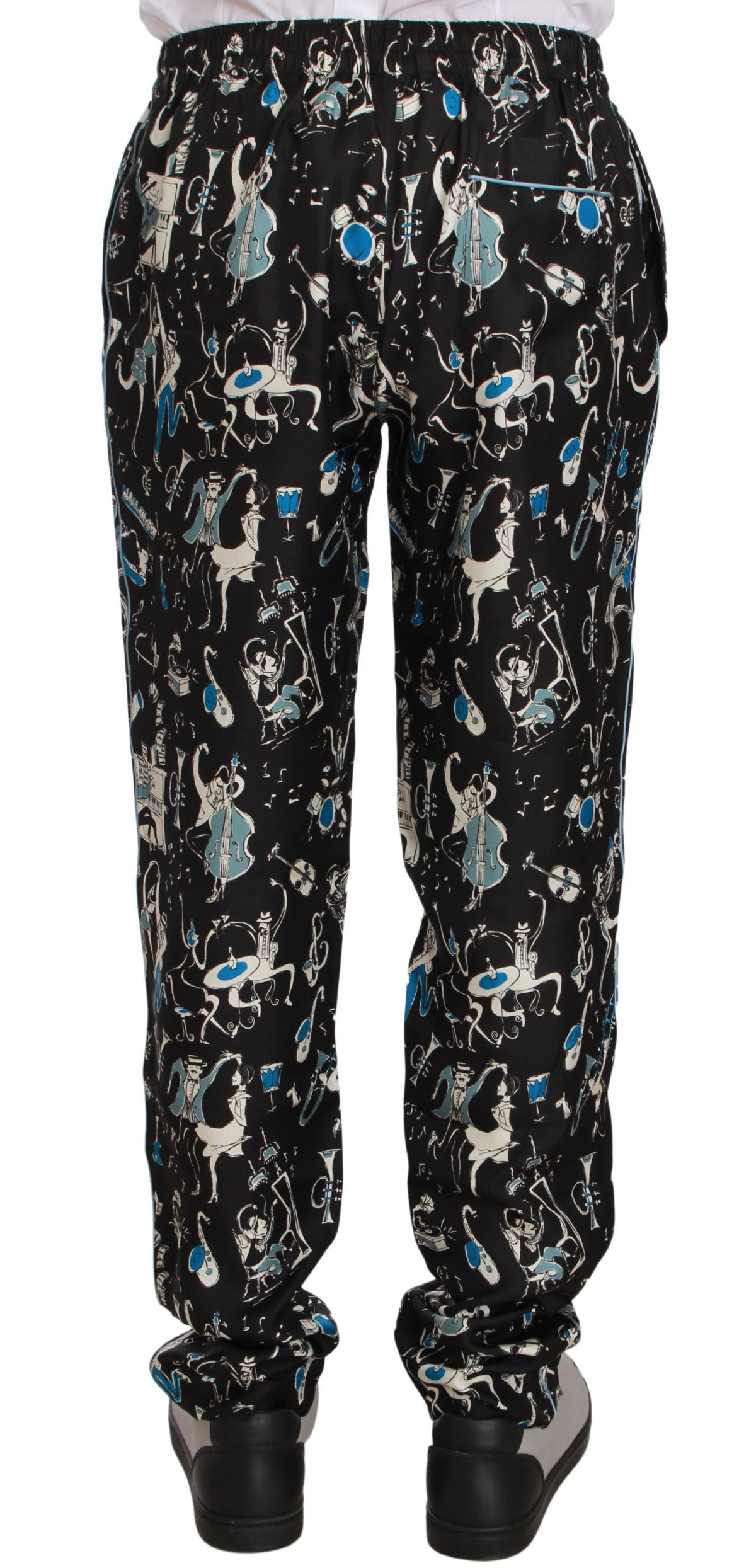 Black Dolce & Gabbana musical instrument print sleepwear pants with relaxed fit and elastic waistband, perfect for comfortable nights.