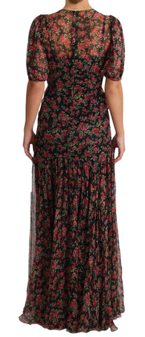 Black floral roses A-line shift gown dress by Dolce & Gabbana hanging on a mannequin with a fitted waist and floral pattern.