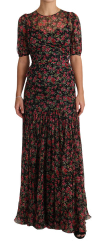 Black floral roses A-line shift gown dress by Dolce & Gabbana, featuring a fitted bodice and flowing skirt with rose print.