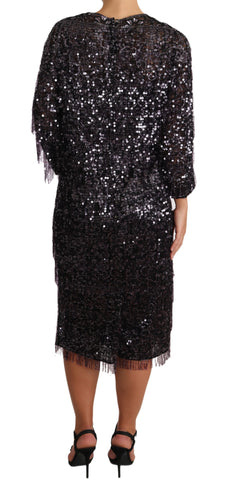 Black sequined long sleeve shift midi dress by Dolce & Gabbana, featuring a fitted silhouette and shimmering sequined fabric.