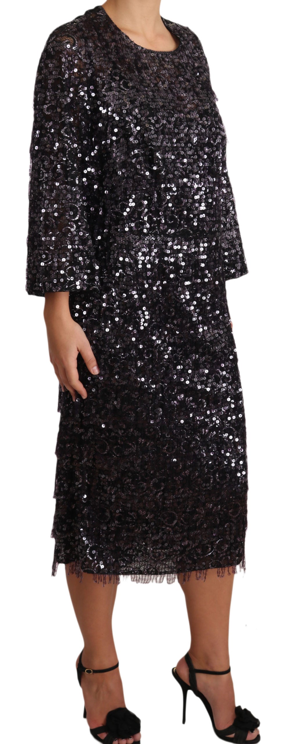 Black sequined long sleeve shift midi dress by Dolce & Gabbana with shimmering sequins and a sleek silhouette.