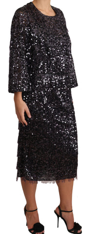 Black sequined long sleeve shift midi dress by Dolce & Gabbana with shimmering sequins and a sleek silhouette.