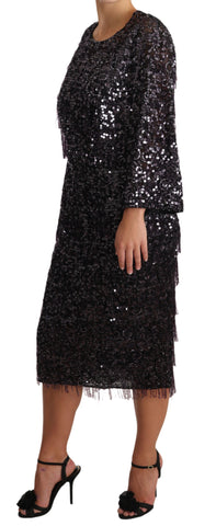 Black sequined long sleeve shift midi dress by Dolce & Gabbana, featuring shimmering sequins and elegant long sleeves.