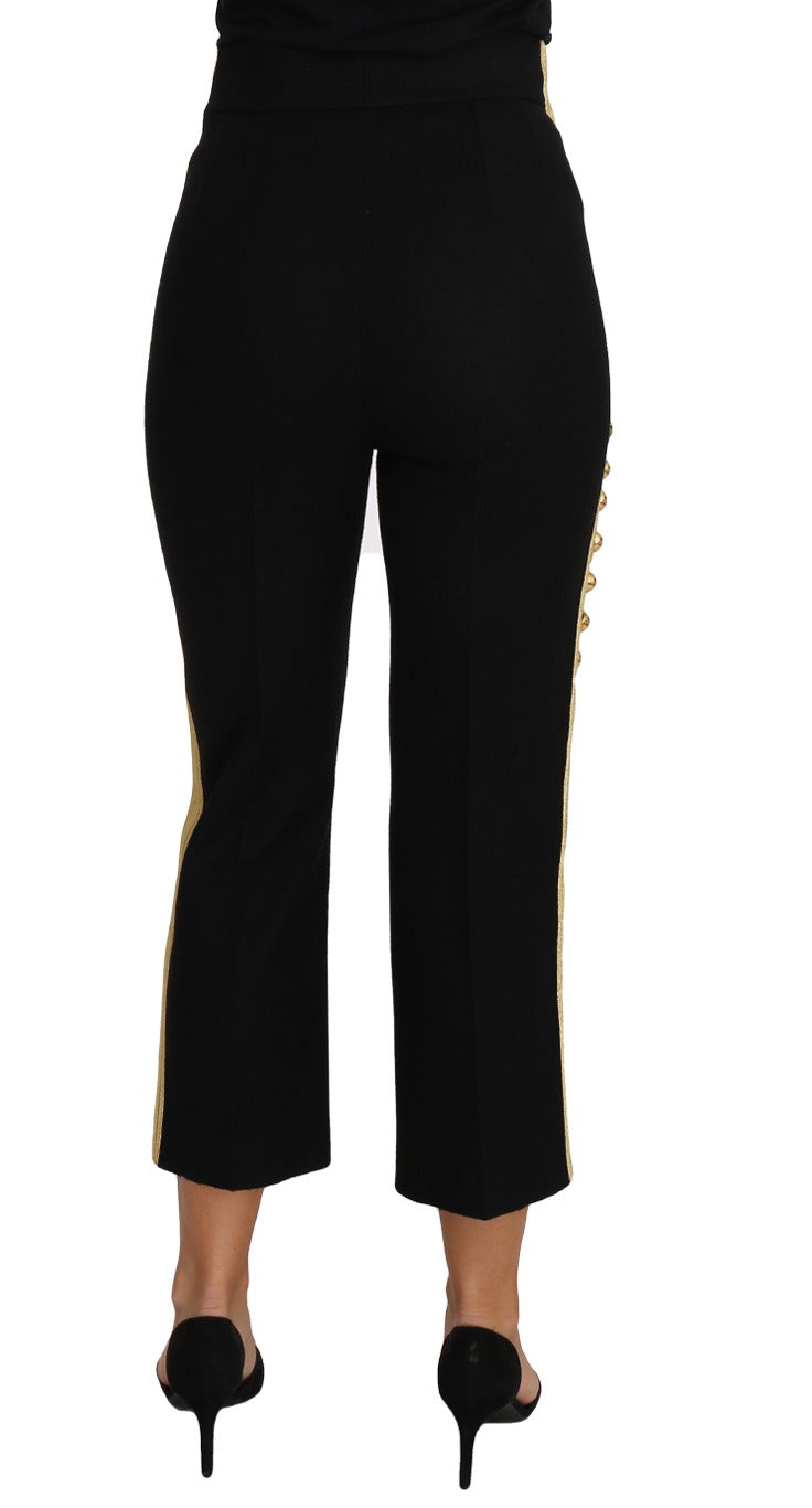 Black military embellished dress pants by Dolce & Gabbana with gold accents, tailored fit, and intricate detailing.
