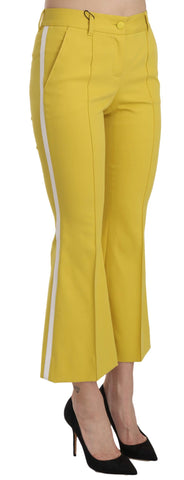 Yellow flared bootcut cotton Capri pants by Dolce & Gabbana, shown with a relaxed fit and stylish flare at the hem.