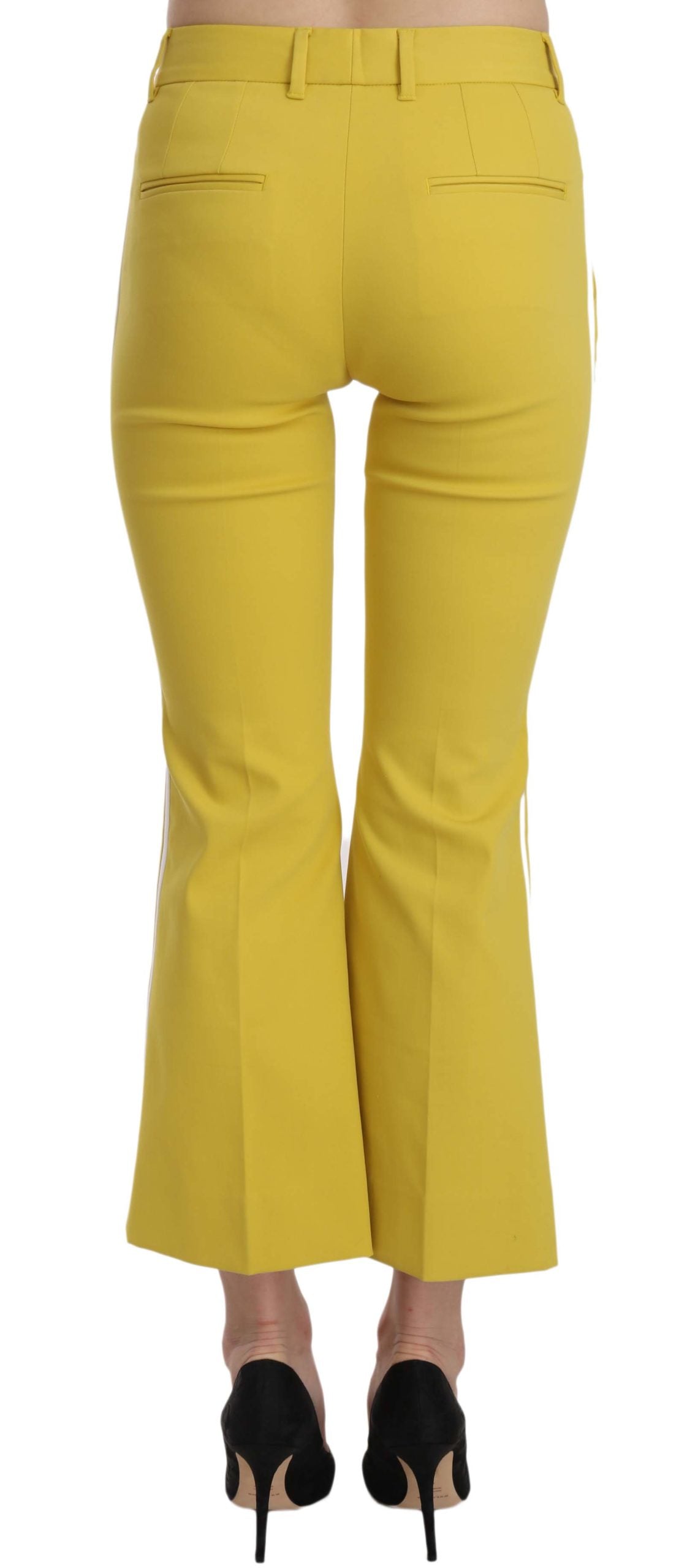 Yellow flared bootcut cotton capri pants by Dolce & Gabbana, showing the relaxed fit and stylish flare design.