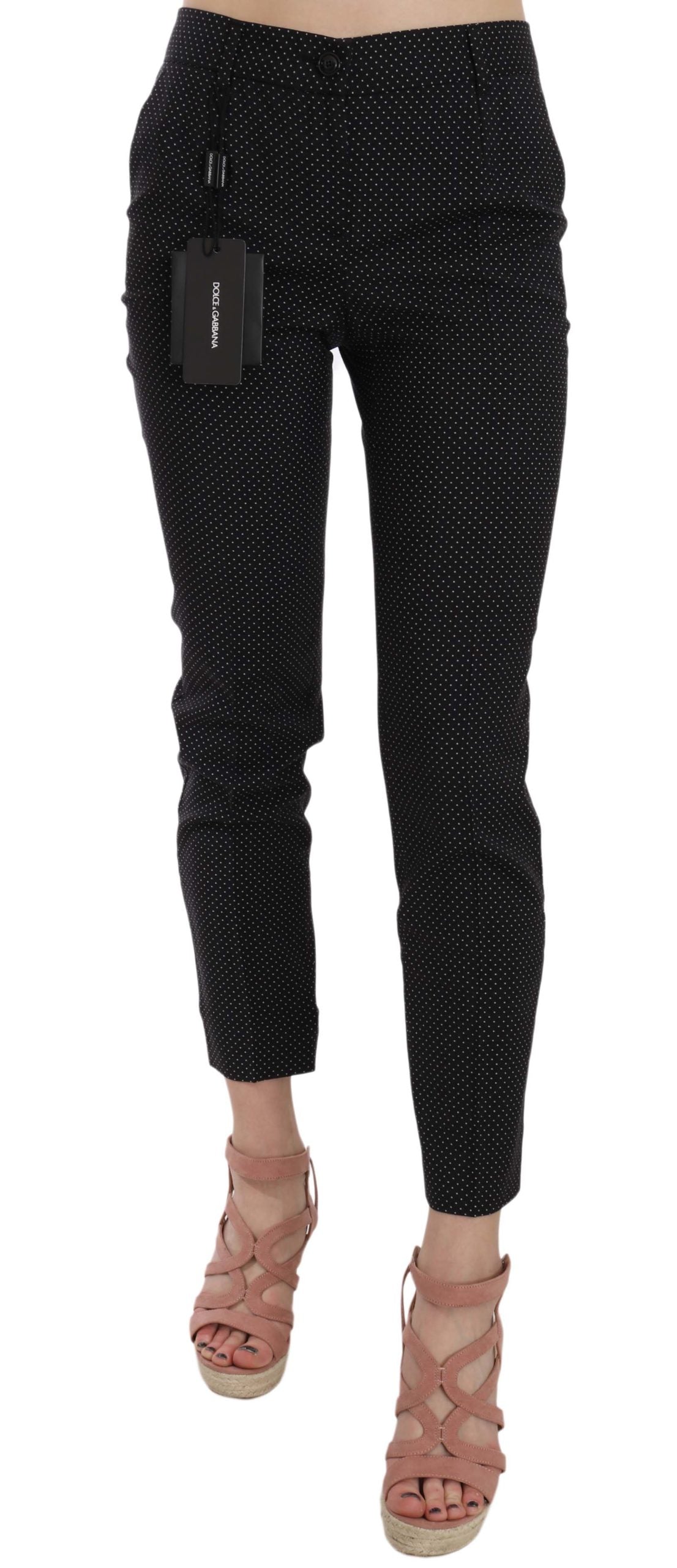 Dolce & Gabbana polka dot slim capri trousers with tapered fit, showcasing stylish pattern and tailored design.