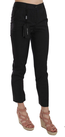 Dolce & Gabbana polka dot slim capri trousers with tapered legs, showcasing a stylish and modern fashion look.