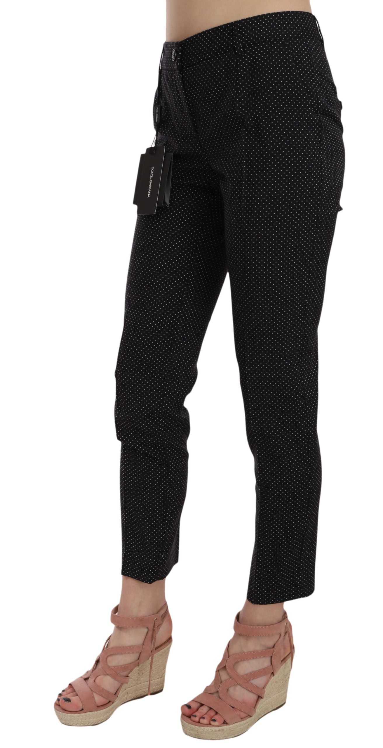 Dolce & Gabbana polka dot slim capri trousers with tapered legs and stylish design, perfect for a chic summer look.