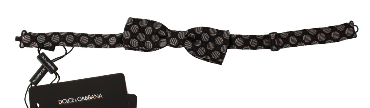 Brown silk polka dot jacquard men's bow tie by Dolce & Gabbana, featuring a classic polka dot pattern and elegant design.