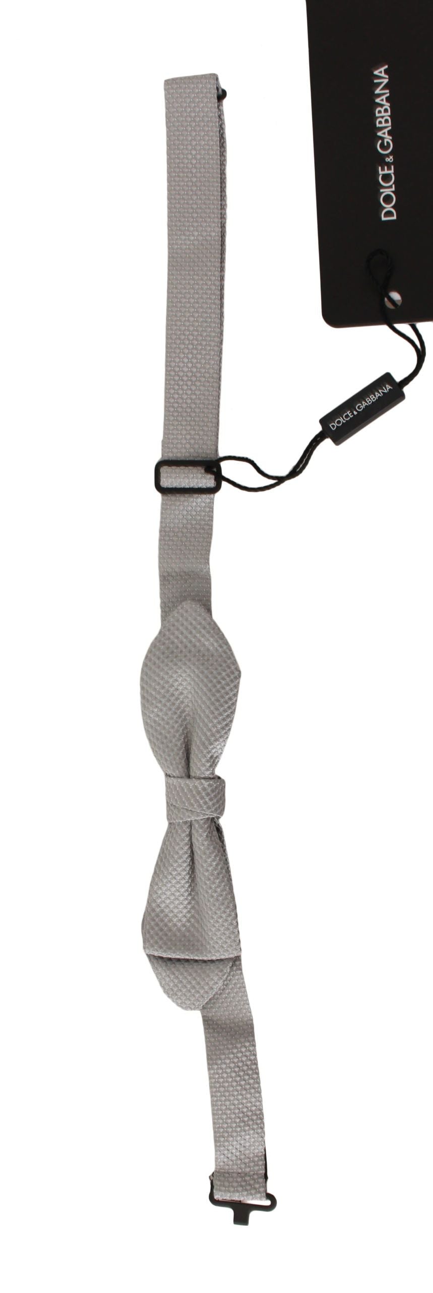 Gray 100% silk faille adjustable bow tie from Dolce & Gabbana featuring a classic papillon style with elegant knot and texture.