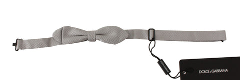 Gray 100% silk faille Dolce & Gabbana bow tie with adjustable neck strap and elegant papillon style.
