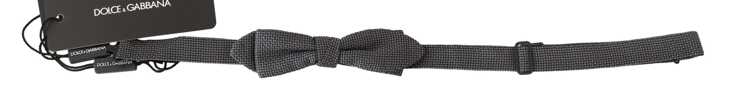 Gray patterned silk adjustable neck bow tie by Dolce & Gabbana, featuring a stylish papillon design.