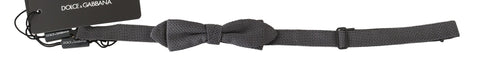Gray patterned silk adjustable neck bow tie by Dolce & Gabbana, featuring a stylish papillon design.