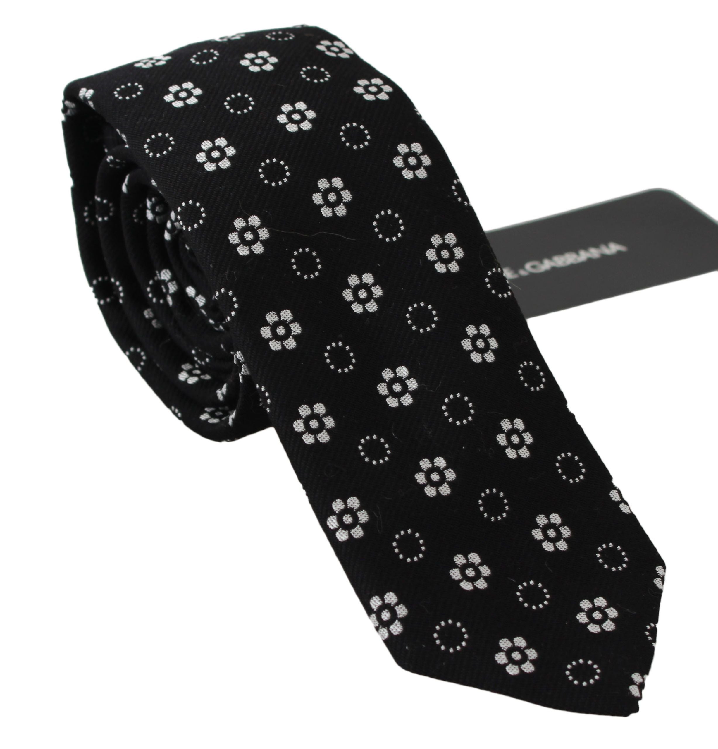 Black 100% silk floral print classic tie by Dolce & Gabbana, featuring elegant floral pattern and smooth silk texture.