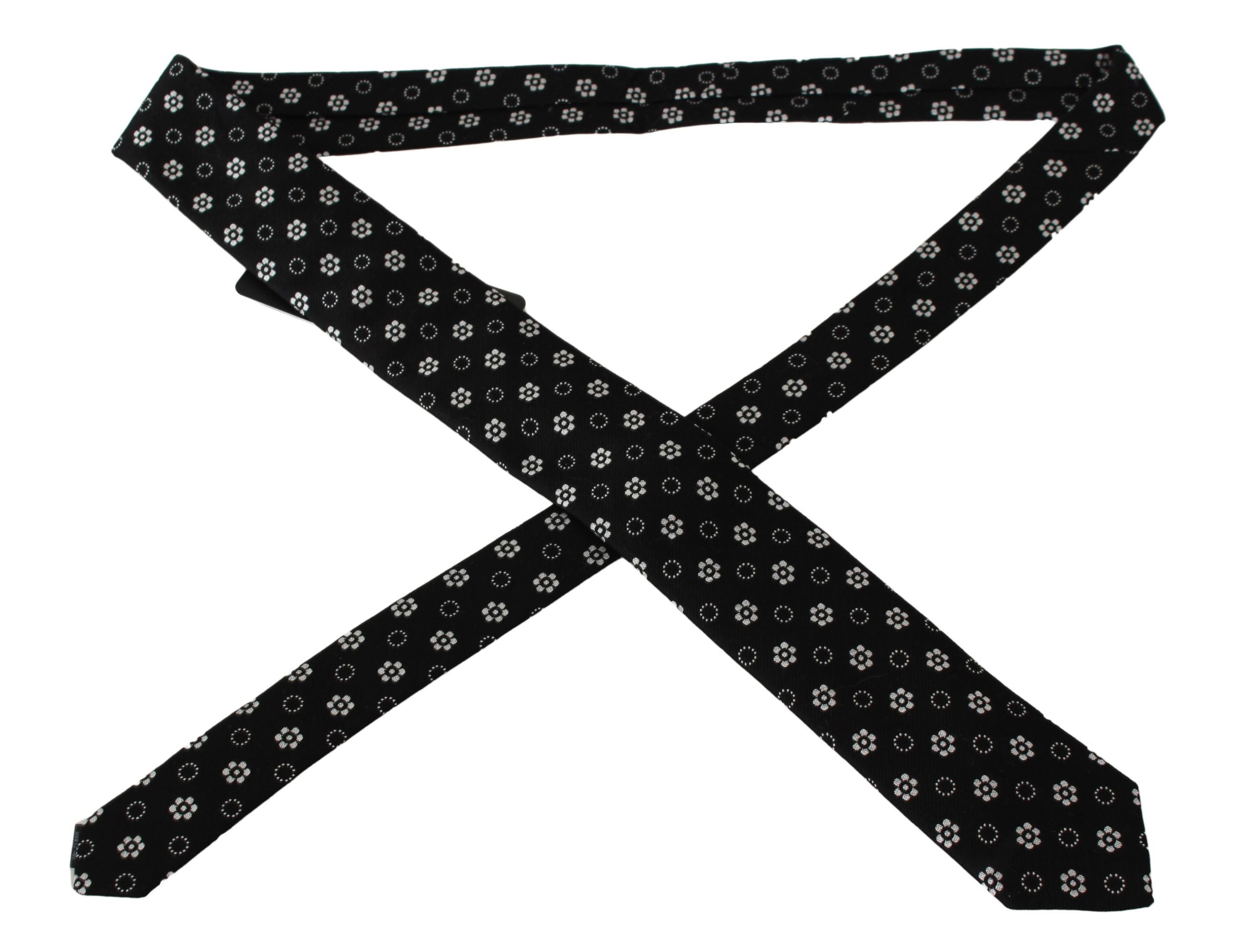 Black 100% silk floral print classic tie by Dolce & Gabbana, featuring elegant design and detailed floral pattern.