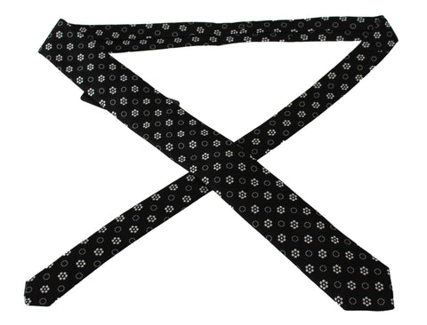 Black 100% silk floral print classic tie by Dolce & Gabbana, featuring elegant design and detailed floral pattern.