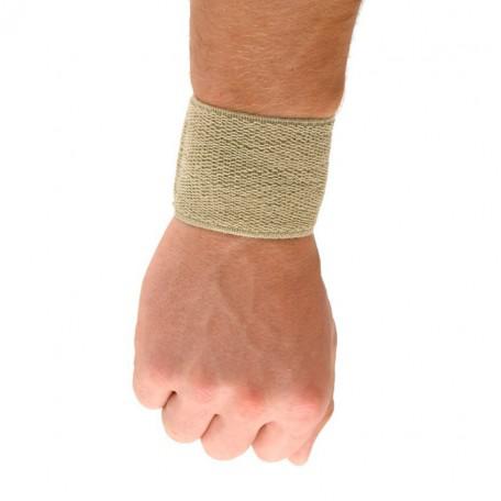 Beige small-sized Lástic-Bass wrist brace from Jag Couture London featuring adjustable straps and comfortable fit.