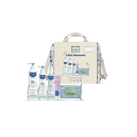 Mustela polka dot stroller bag set with five pieces from Jag Couture London - New York, featuring stylish and functional baby accessories.