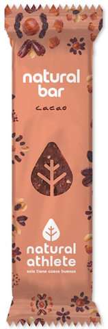Natural Athlete cacao organic energy bar by Jag Couture London with visible cacao nibs and natural ingredients in a close-up shot.