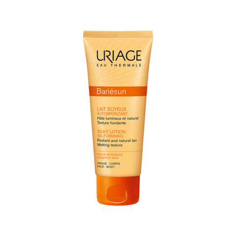 Uriage Silky Self Tanning Milk in 100ml bottle, showcasing smooth texture and golden tint, by Jag Couture London - New York.