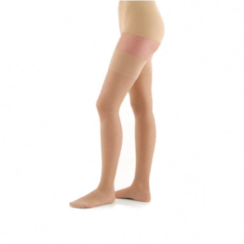 Beige Varisan long stockings by Jag Couture London - New York, featuring smooth, sheer fabric and a comfortable fit.