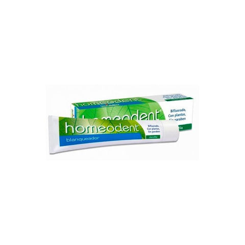 Jag Couture London New York Boiron Homeodent Chlorophyll whitening toothpaste 75ml tube with green and white packaging visible.