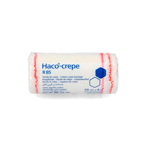 Hartmann Haco-Crepe Bandage 4m x 10cm, medical elastic bandage by Jag Couture London New York, shown rolled out and ready for use.