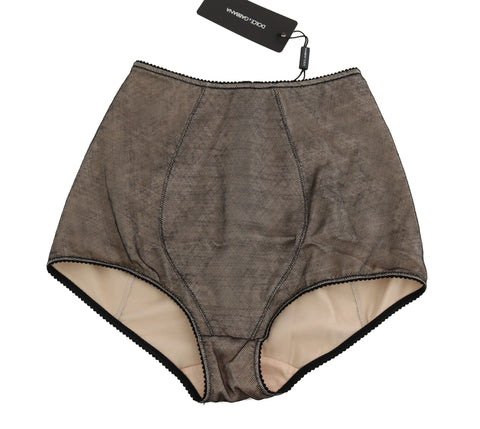 Beige Dolce & Gabbana underwear bottoms with black net detailing, shown lying flat on a white surface.