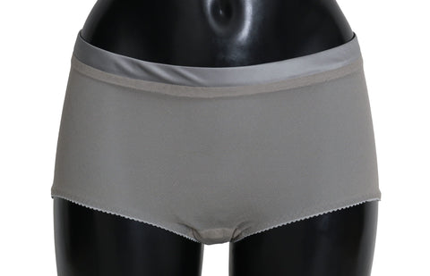 Silver Dolce & Gabbana underwear with net silk bottoms, featuring intricate lace and delicate fabric details.
