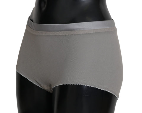 Silver Dolce & Gabbana underwear with net silk bottoms, featuring intricate lace details and a luxurious, elegant design.