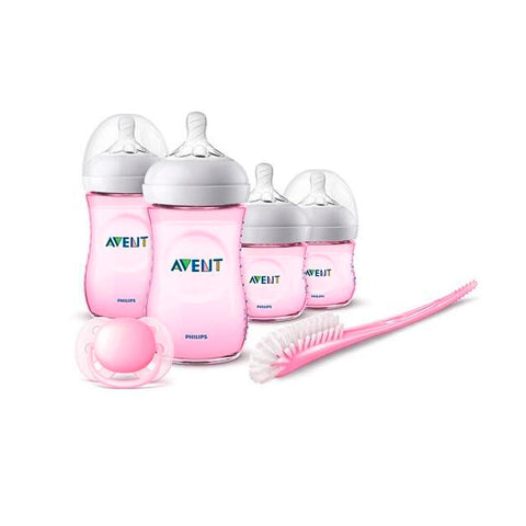 Pink Avent newborn gift set by Jag Couture London featuring 6 pieces, including soft clothing items and accessories for baby girls.